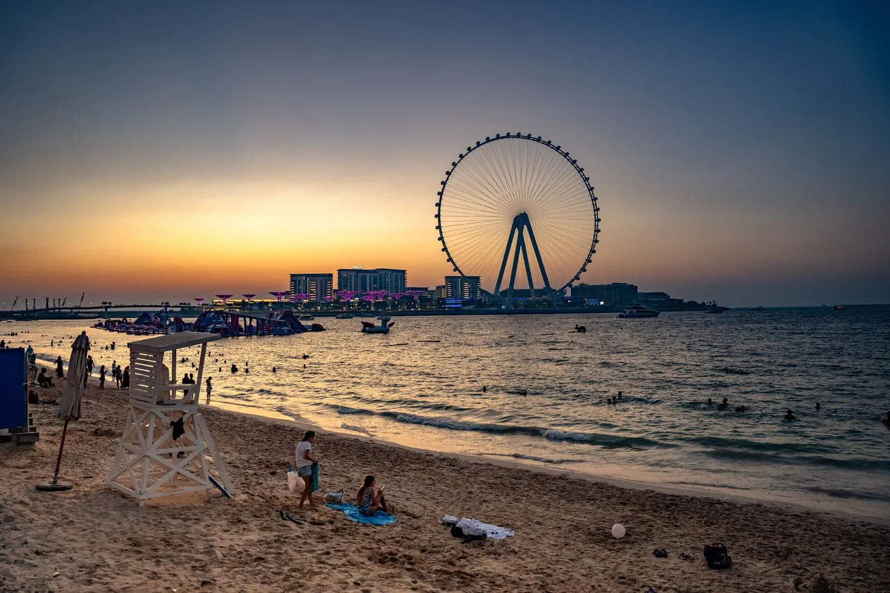 The Beach at JBR in Dubai with loungers and the Marina skyline behind