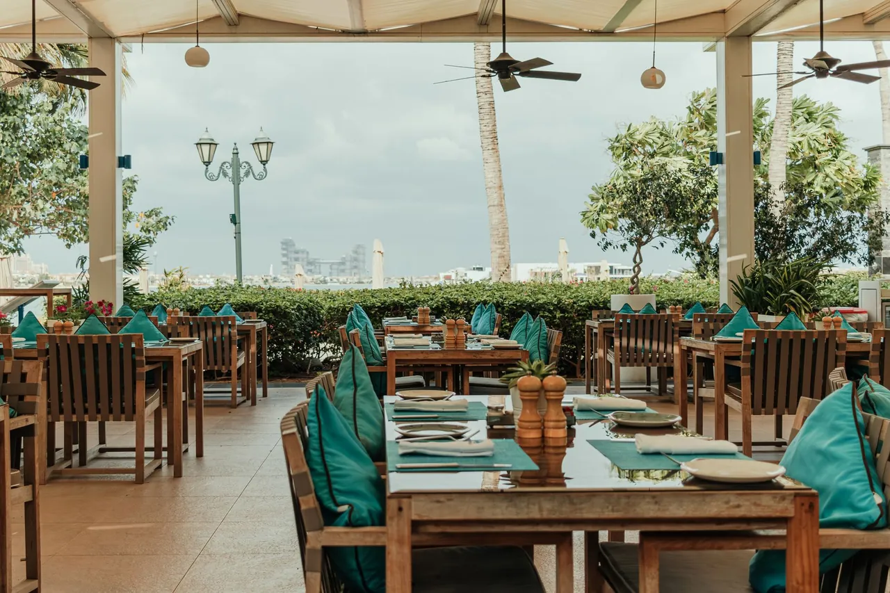 Beachside dining terrace at a Dubai resort during a family brunch