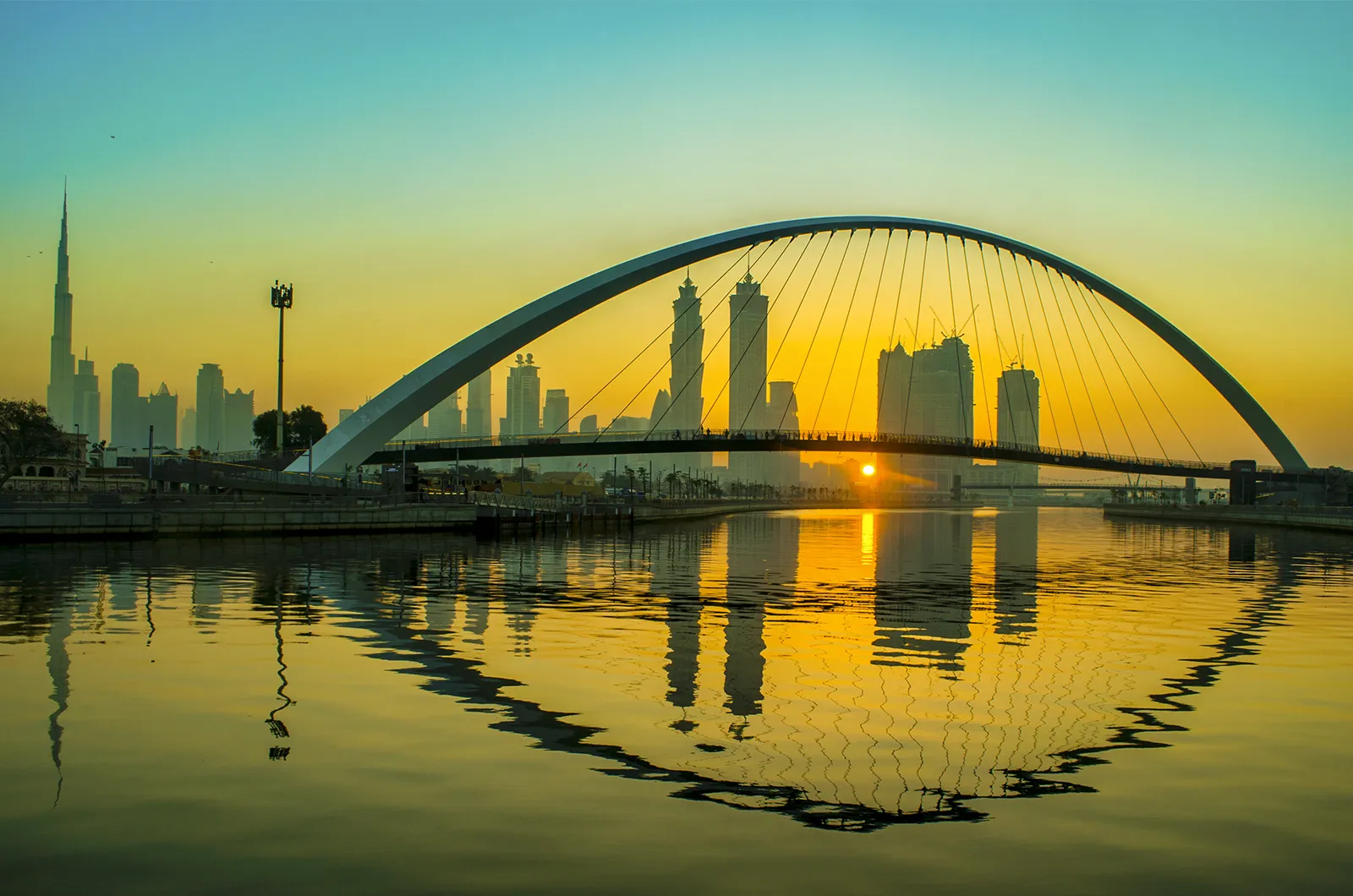 The Tolerance Bridge over Dubai Water Canal at sunset, United Arab Emirates