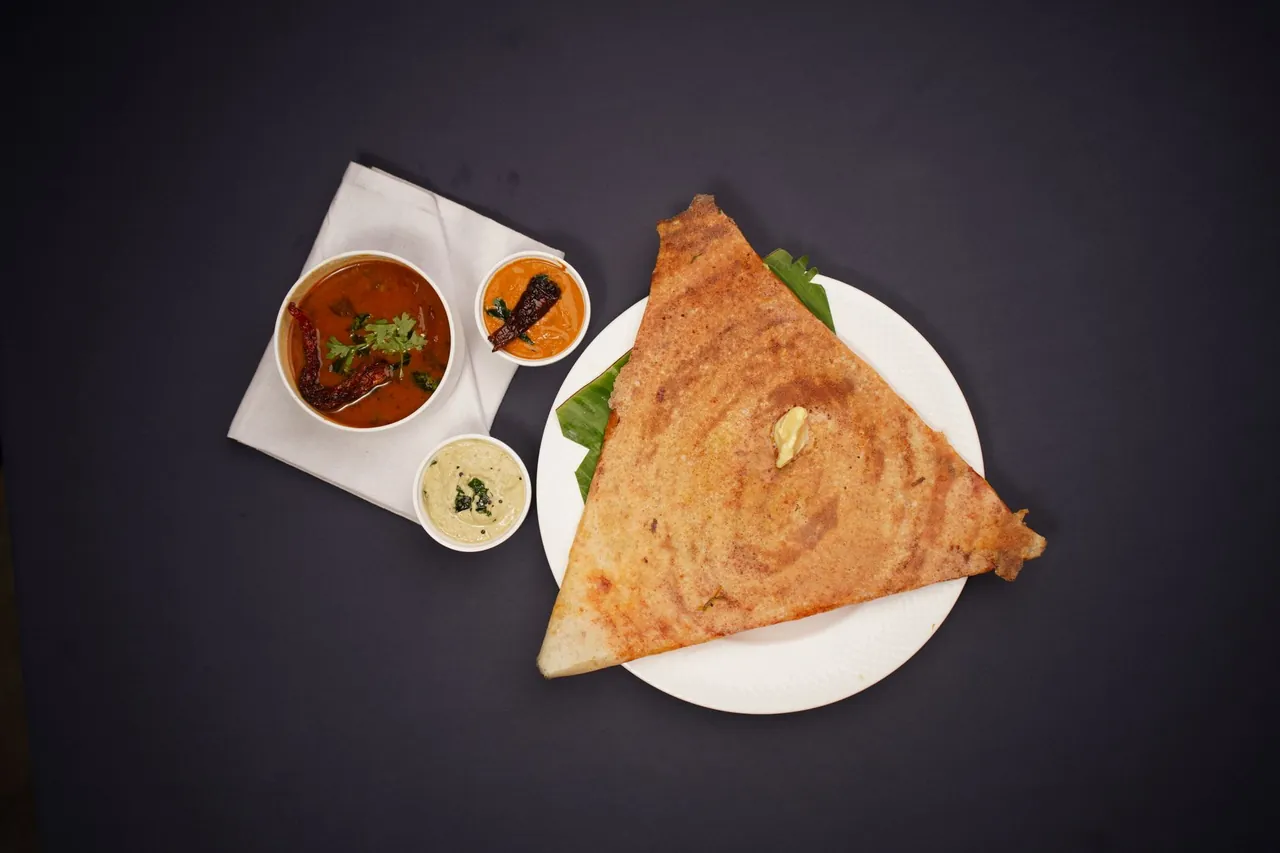 Crisp masala dosa with potato filling at a South Indian restaurant in Dubai