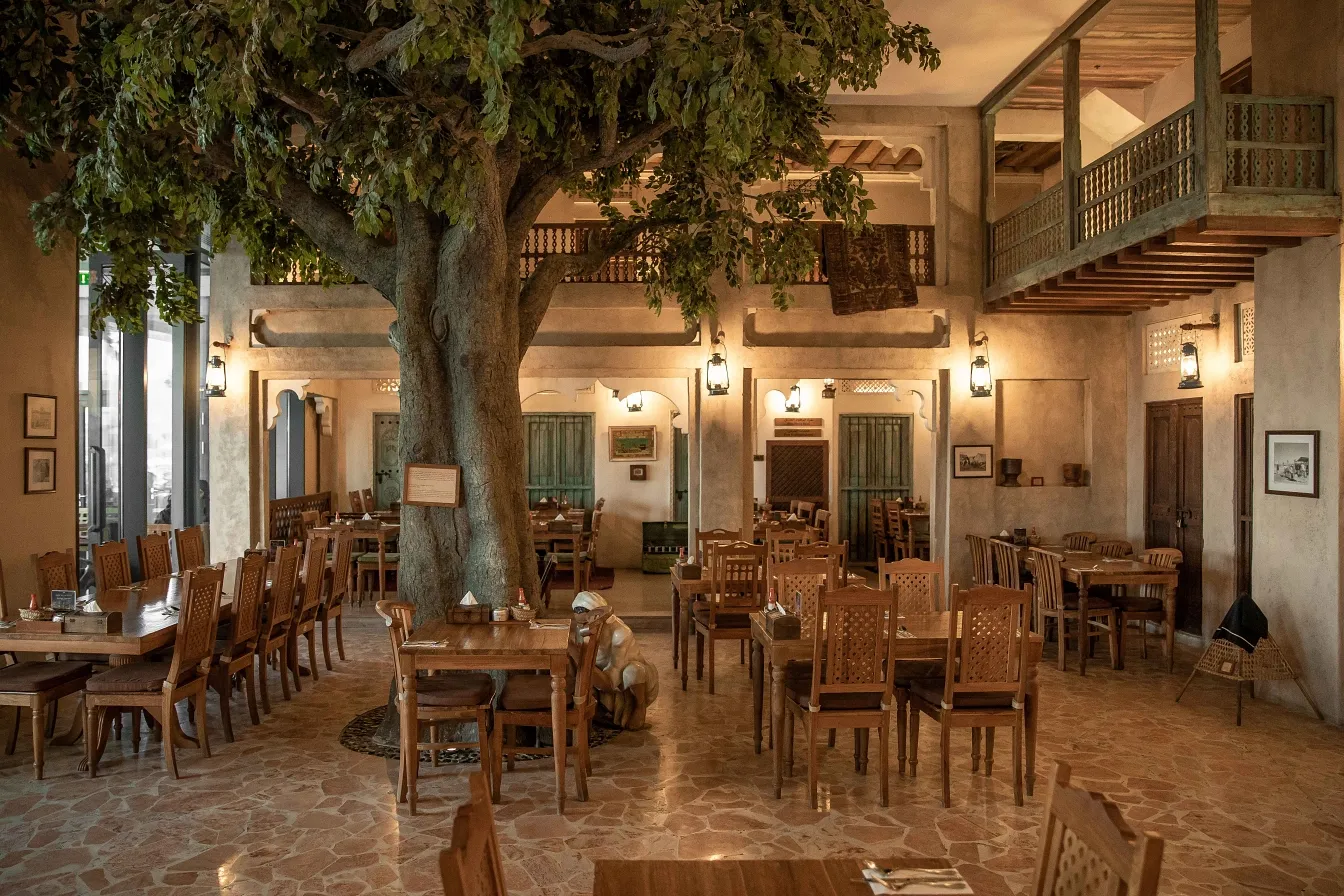A traditional Emirati restaurant interior with regional dishes served in Dubai, UAE