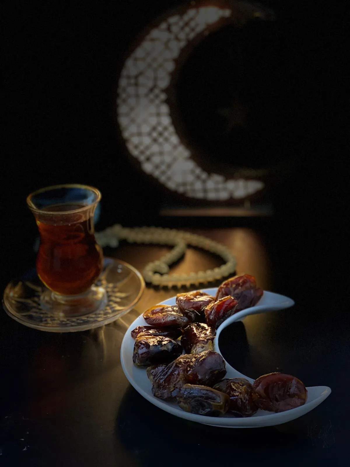 Small cups of Arabic coffee served with dates in the UAE