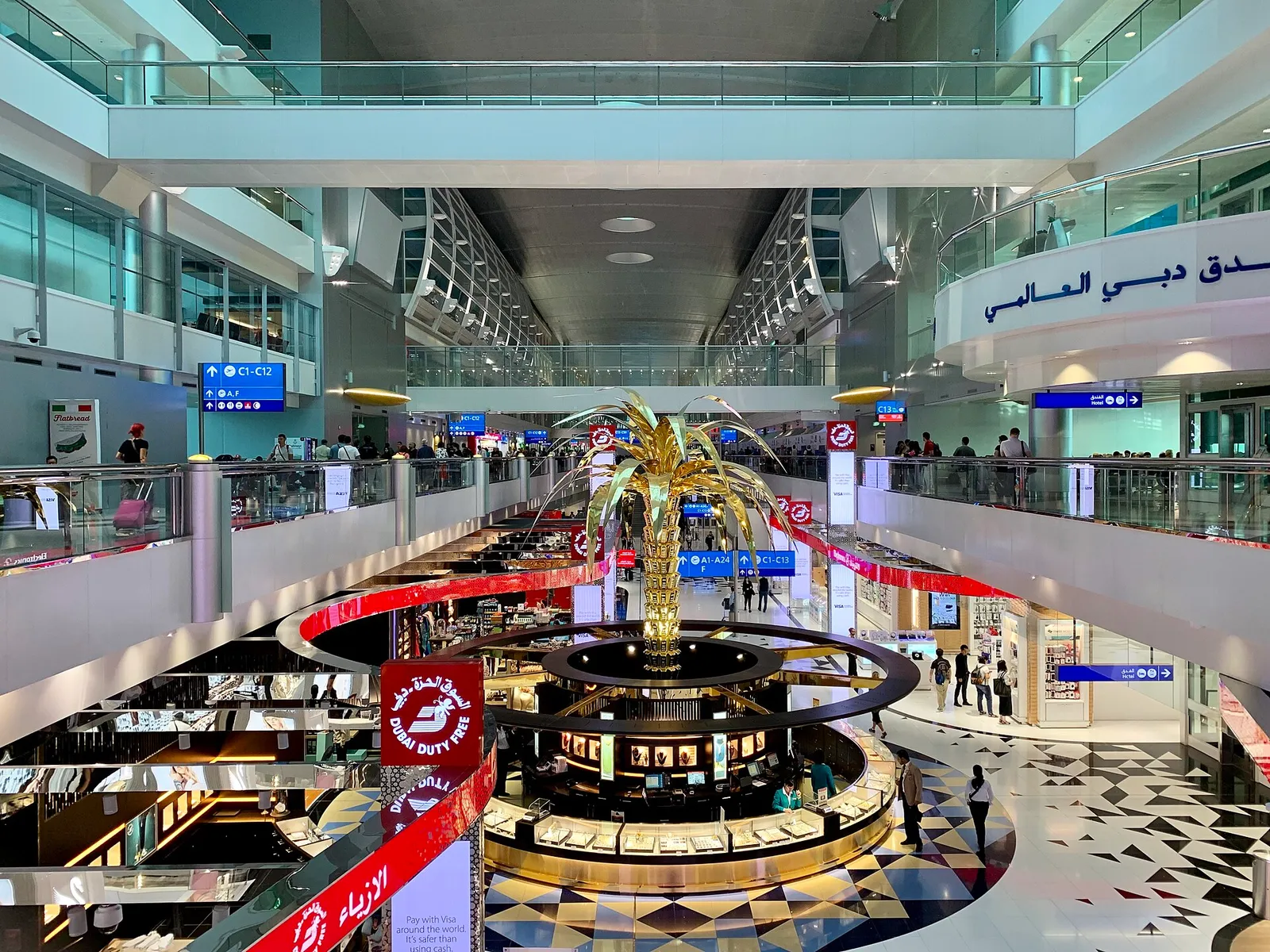 The bright modern interior of a terminal at Dubai International Airport in the UAE
