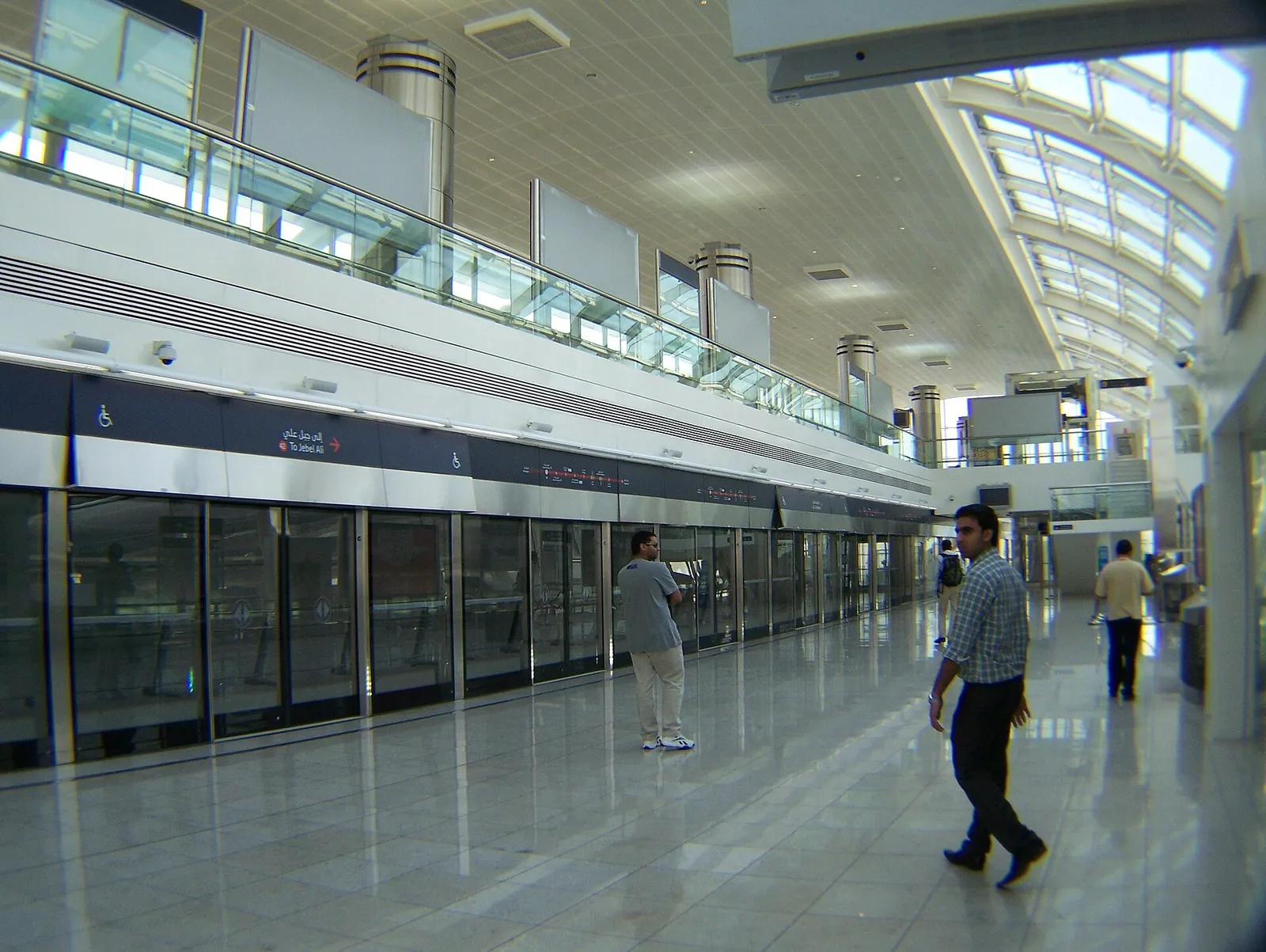 A wide concourse inside Dubai International Airport, United Arab Emirates