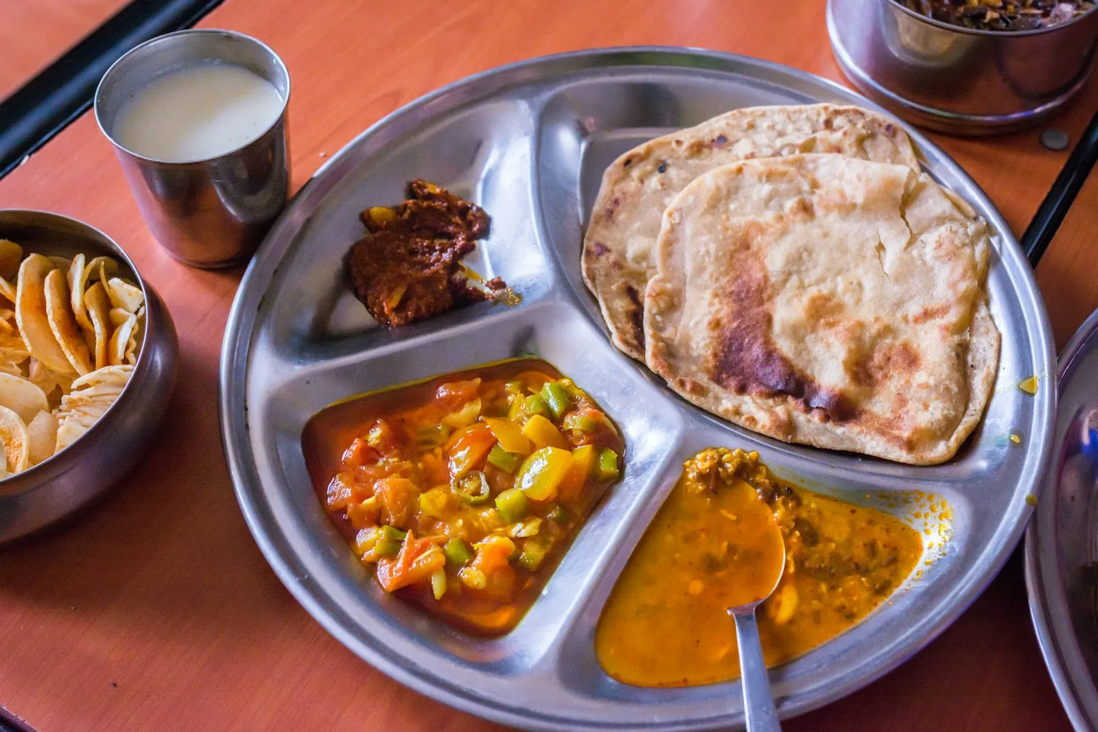 Colourful vegetarian Indian thali with dal and curries served in Dubai