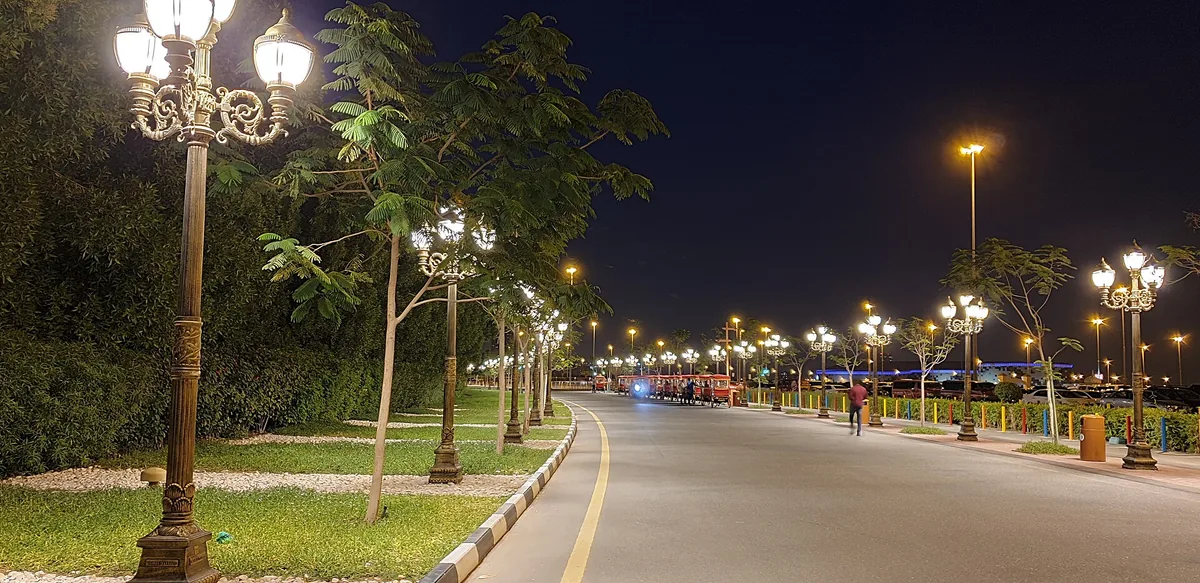 A lit visitor avenue in the evening