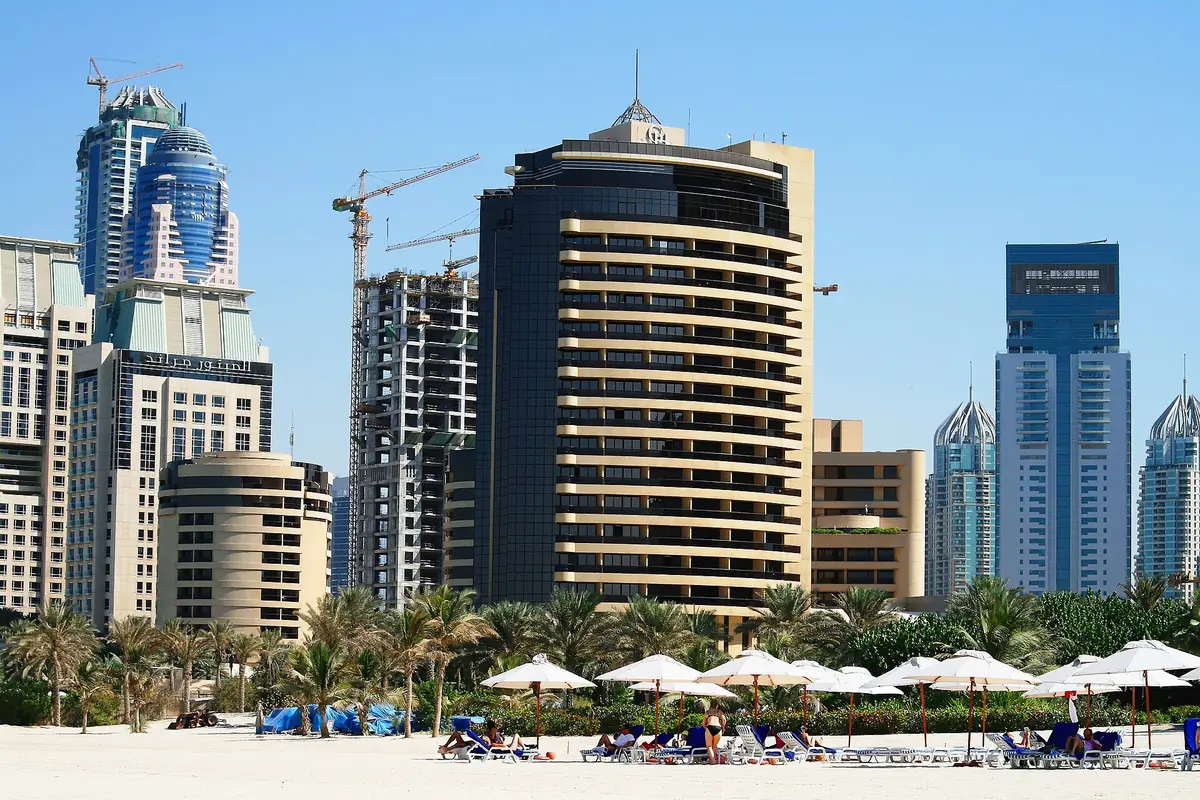 An open sand beach with shallow water