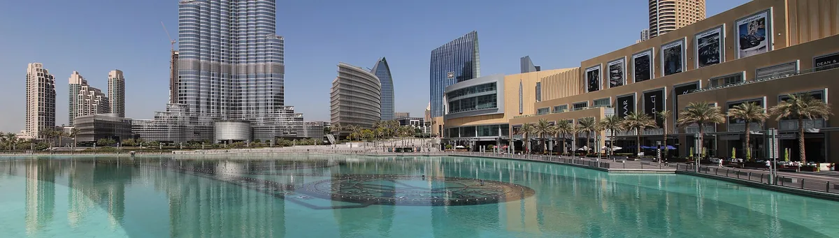 A city lake ringed by buildings and terraces