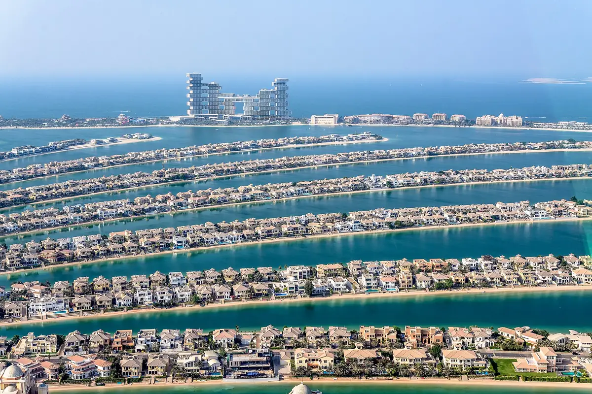 An aerial view of a palm shaped artificial island